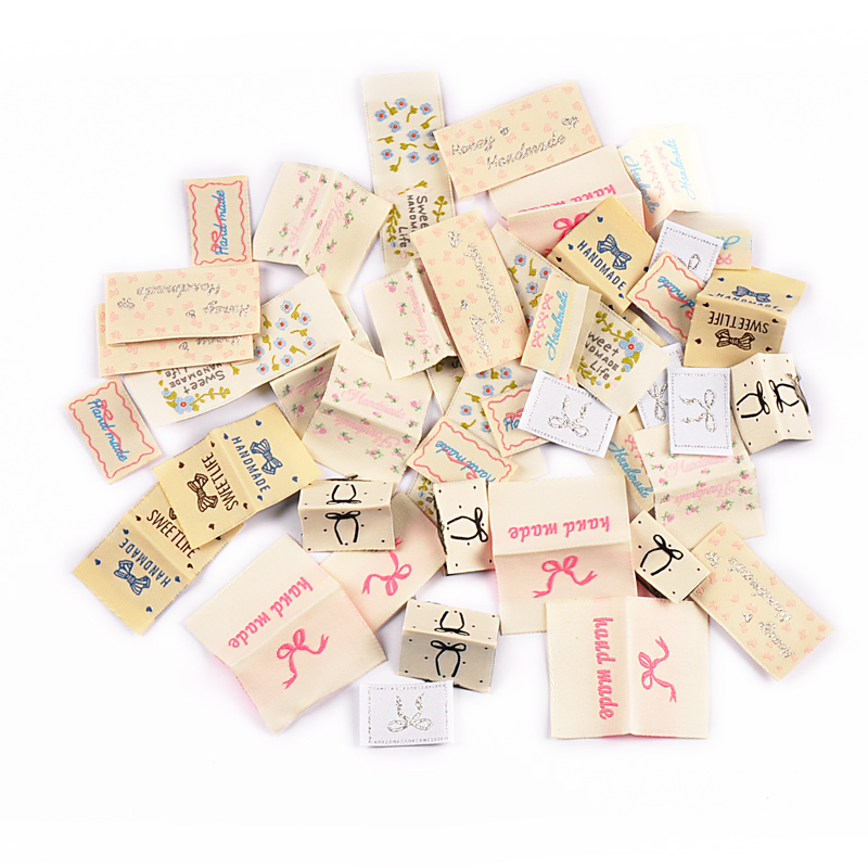 30 個 20-71 ミリメートルミックス絶妙な弓/花柄ラベ - Baby Clothing Labels のレビューと価格